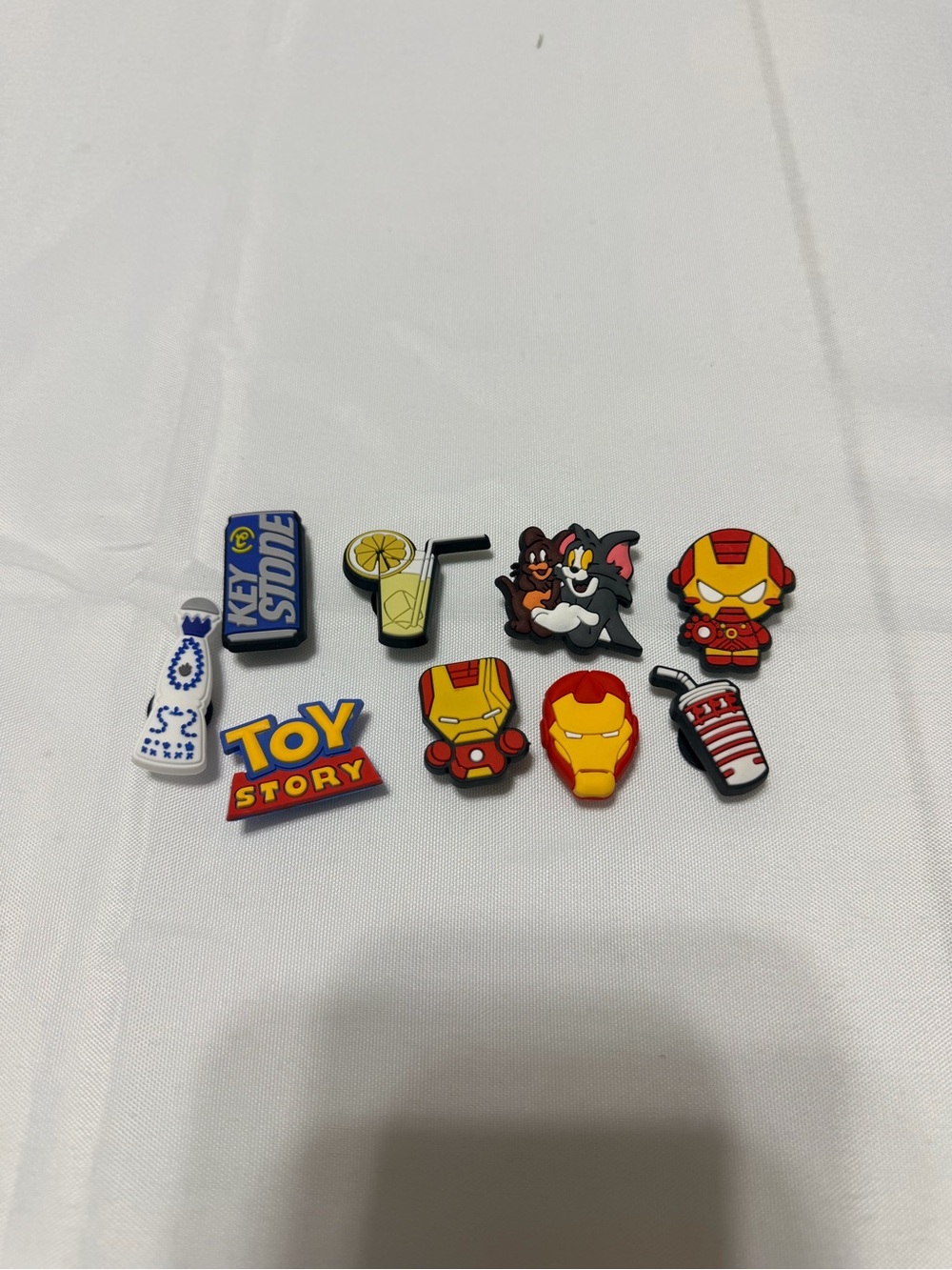 Lot of 9 Toy Story & Marvel Character Shoe Charms - Red, Yellow, Blue